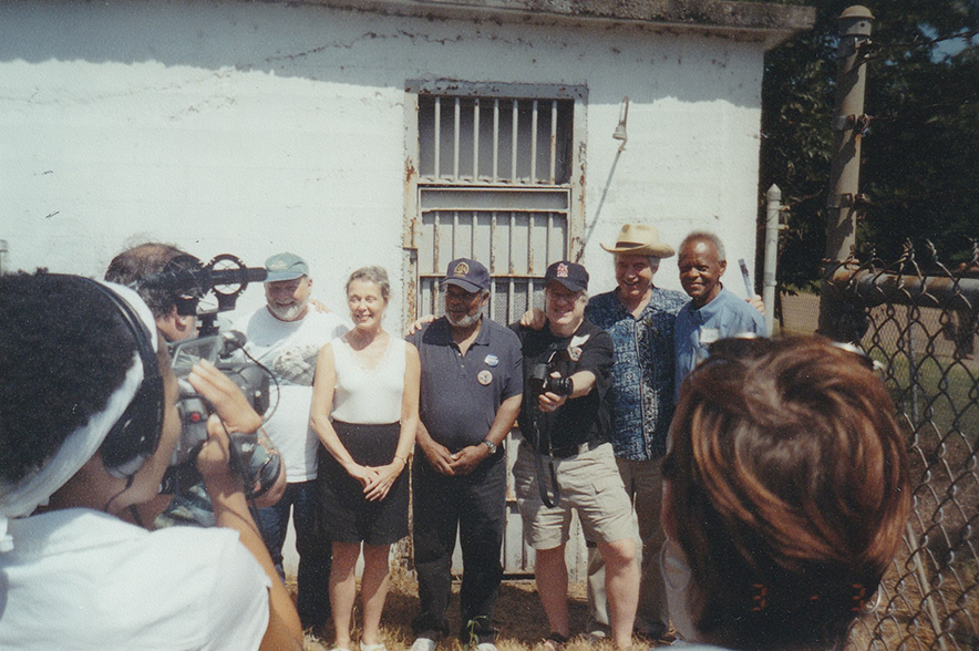 Freedom Summer volunteers at the 2004 reunion stand outside Drew jail where they had been locked up for protesting.